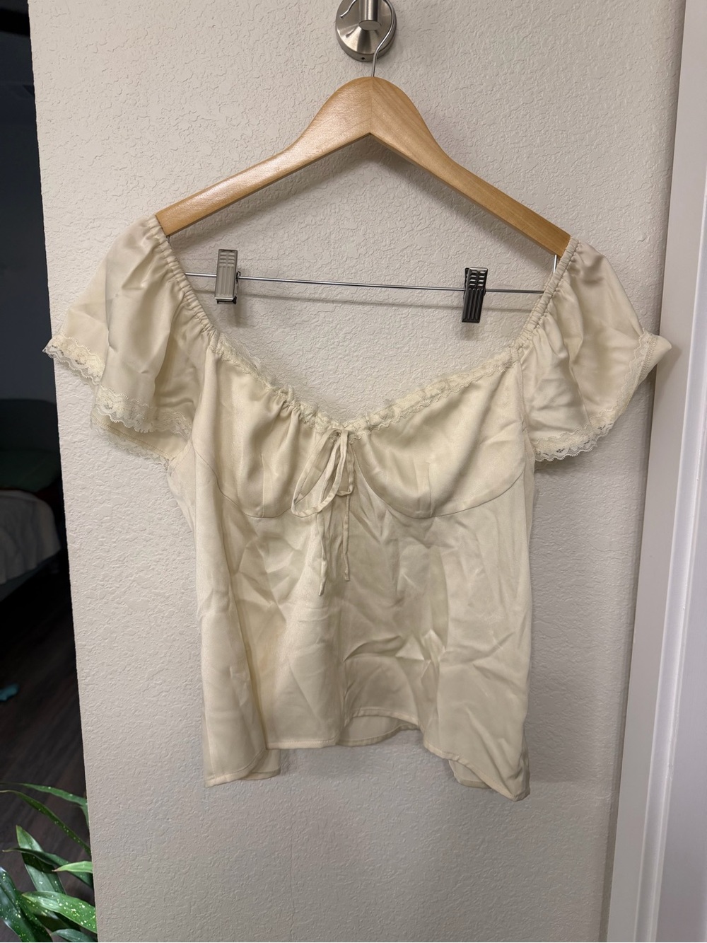 Women's Cream Silky Top with Lace Trim and adjustable neckline
